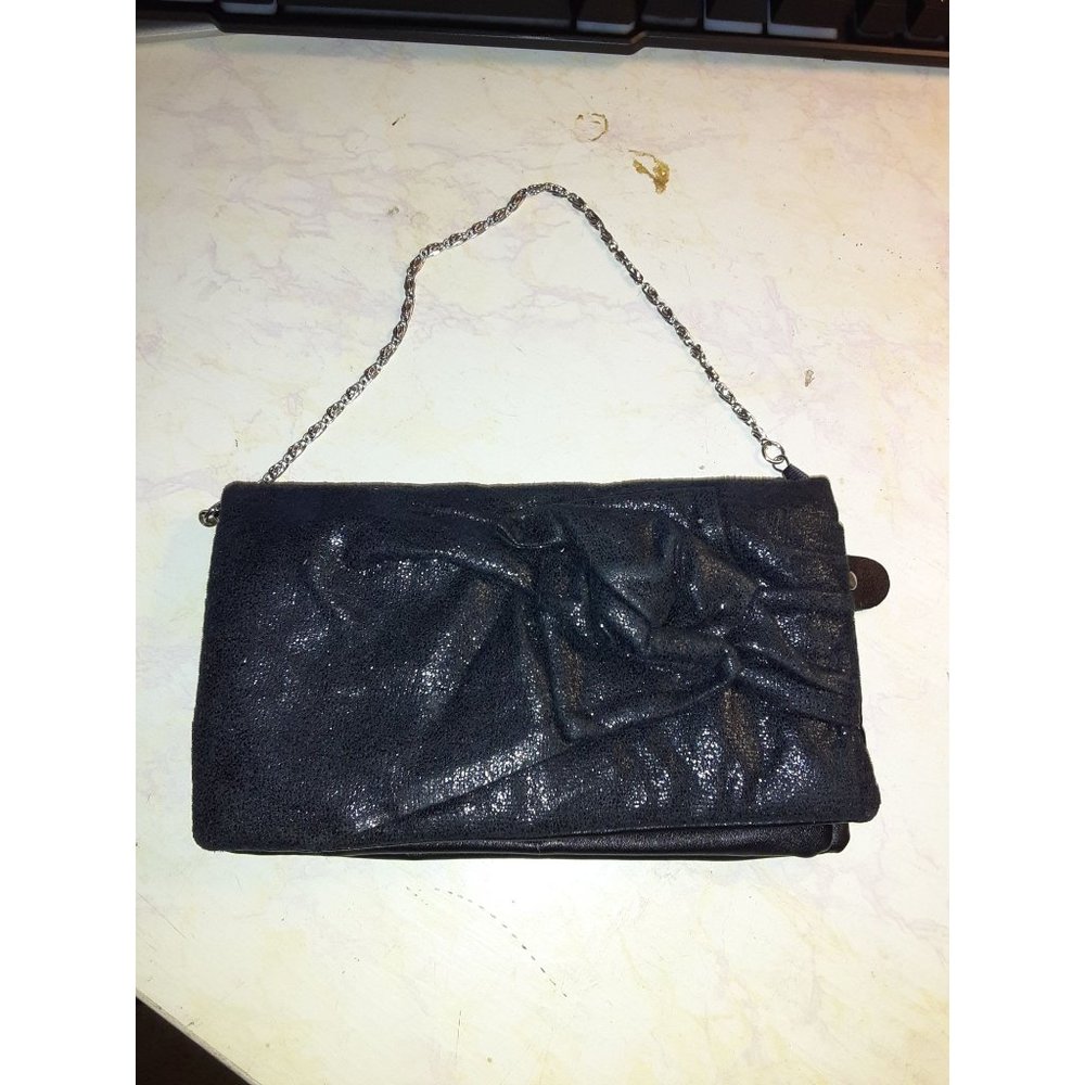 Far Nine Clutch Purse